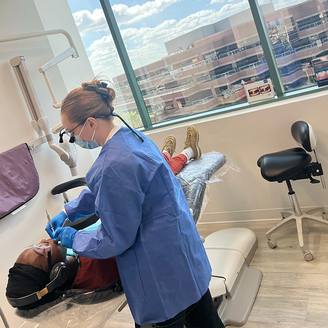 Dr. Ijeoma Igwe in the patient chair.